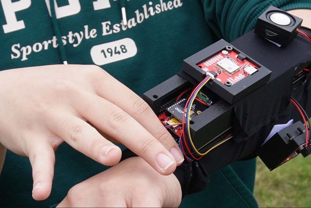 A close of up a disc golf locator armband module with the GPS, Xbee, and speaker modules in view.