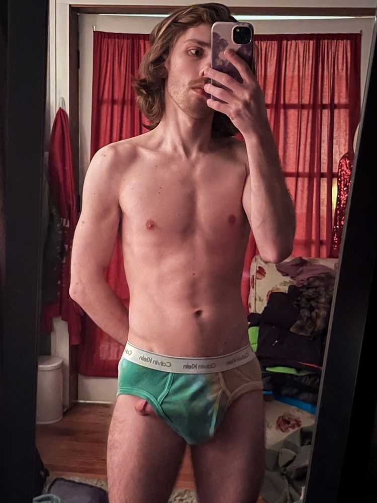 me in a pair of green tie-dye calvin klein briefs with my hard dick coming out the leg hole
