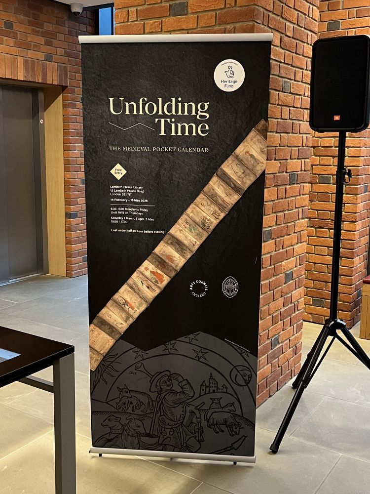 A vertical exhibition sign for the 'Unfolding Time' exhibition at Lambeth Palace Library 