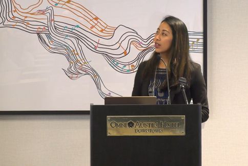 A close-up of Dr. Agtarap, presenting findings from her talk,  "Associations between posttraumatic growth and depreciation, environmental limitations, and psychosocial outcomes following moderate-severe TBI: Findings from a mixed-methods pilot study".