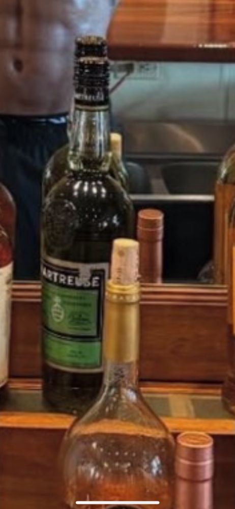 Picture of an unopened bottle of chartreuse, zoomed in from original photo. 