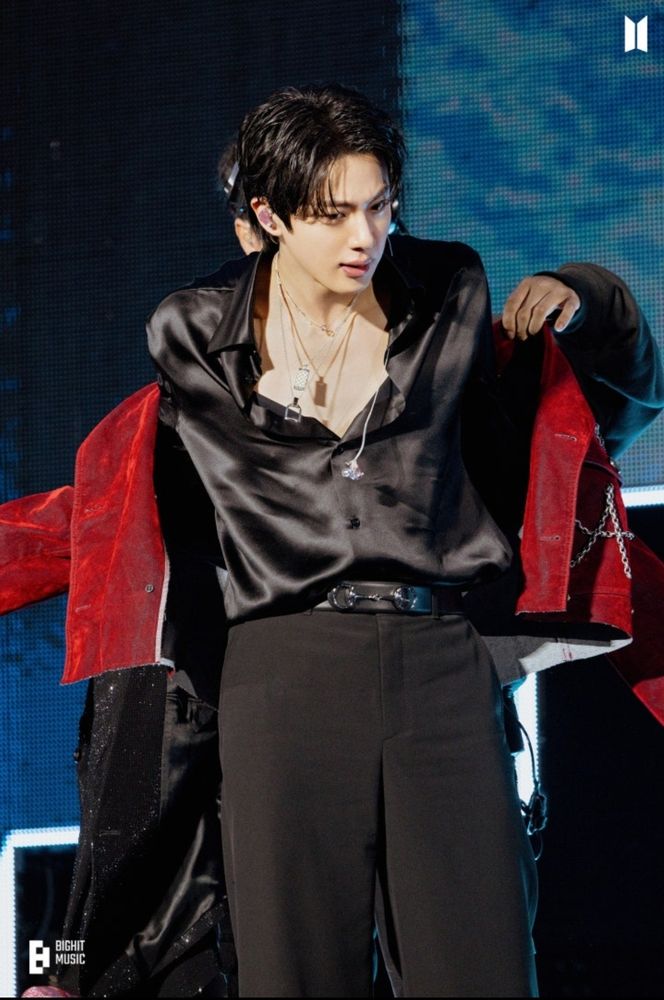 Jin does an onstage outfit change.
This would be an appropriate time to be jealous of his jewelry.