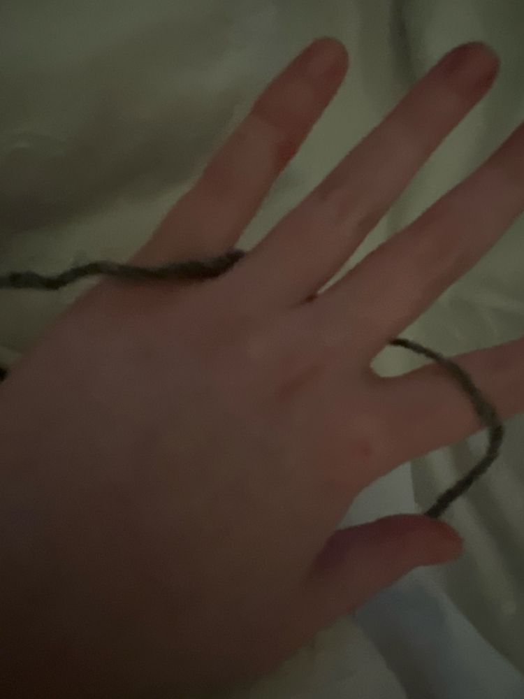 hold yarn over forefinger, under middle 2, over pinky