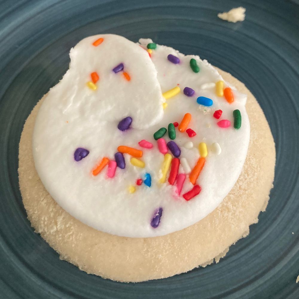 chewy terrible cookie with an unreasonable amount of birthday cake ass frosting and bullshit idiot sprinkles