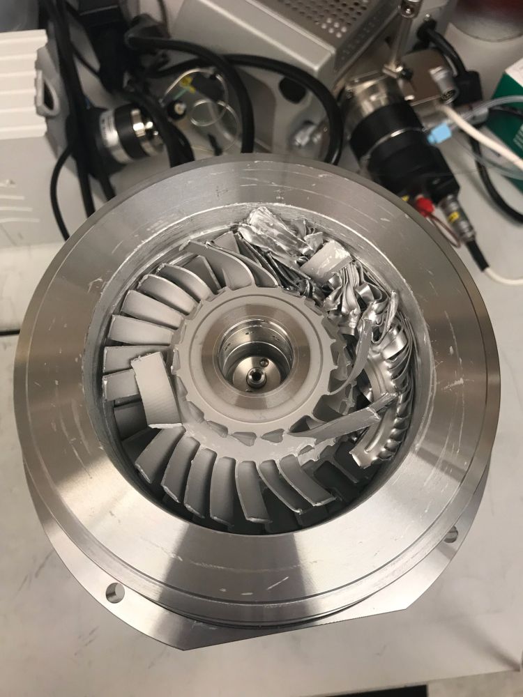 shredded blades of a blown turbo pump