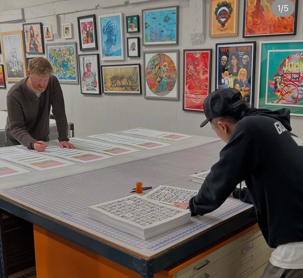 Seth Armstrong and Cryptik signing prints at Static Medium