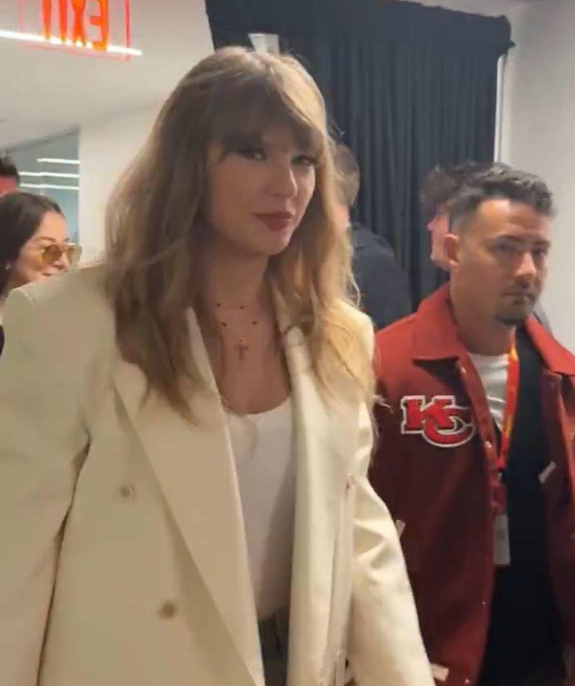 Taylor Swift wears a white blazer to the Super Bowl on February 9, 2025.