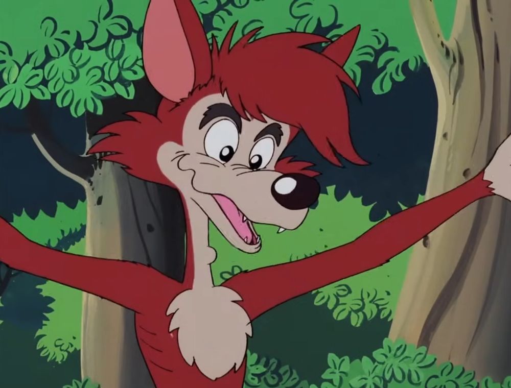 Mr. Wolf spreading out his arms with a smile