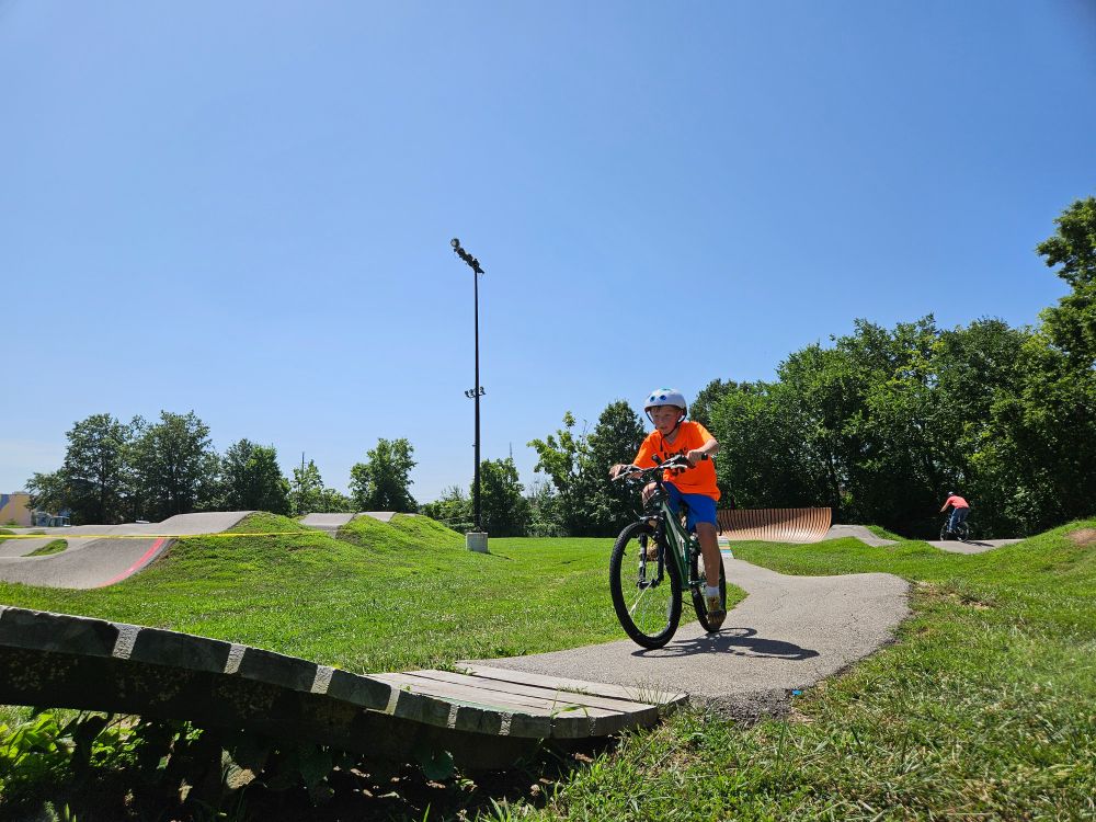 Another bike student takes on an incline at Kinetic Park.