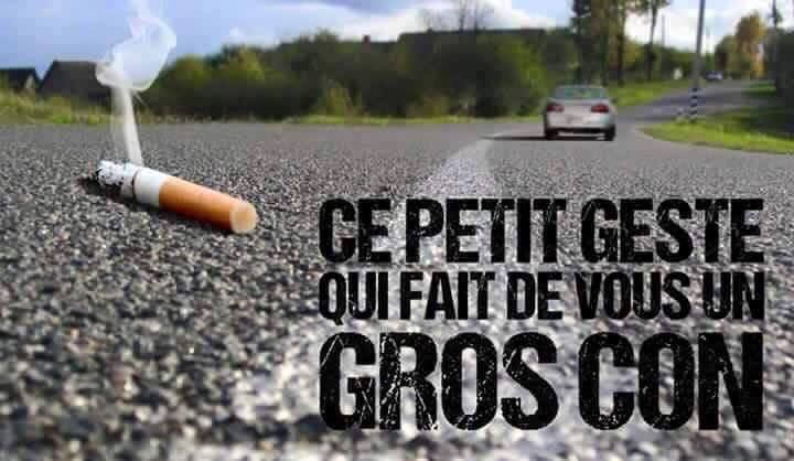 un mégot sur une route jeté d une voiture