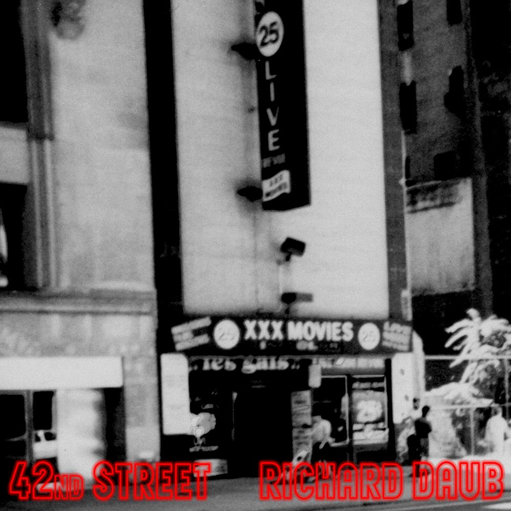 An early 1990s photo of a XXX movie and peep show place on 42nd Street in Times Square, New York City.