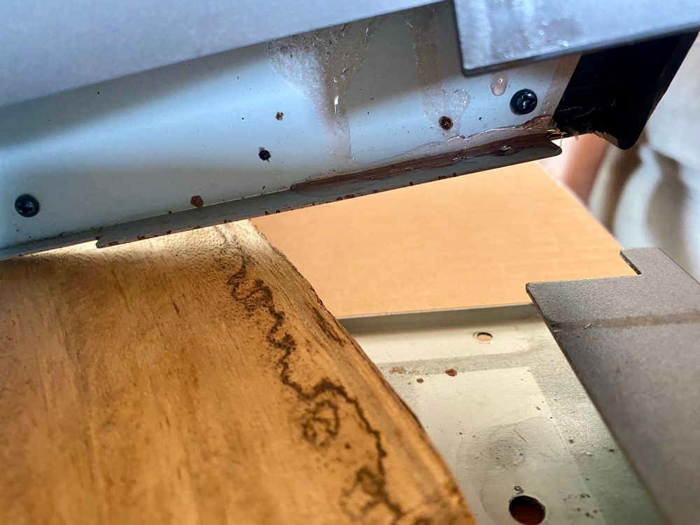 The right, internal portion of the JD800, where red glue dripped down and was captured.