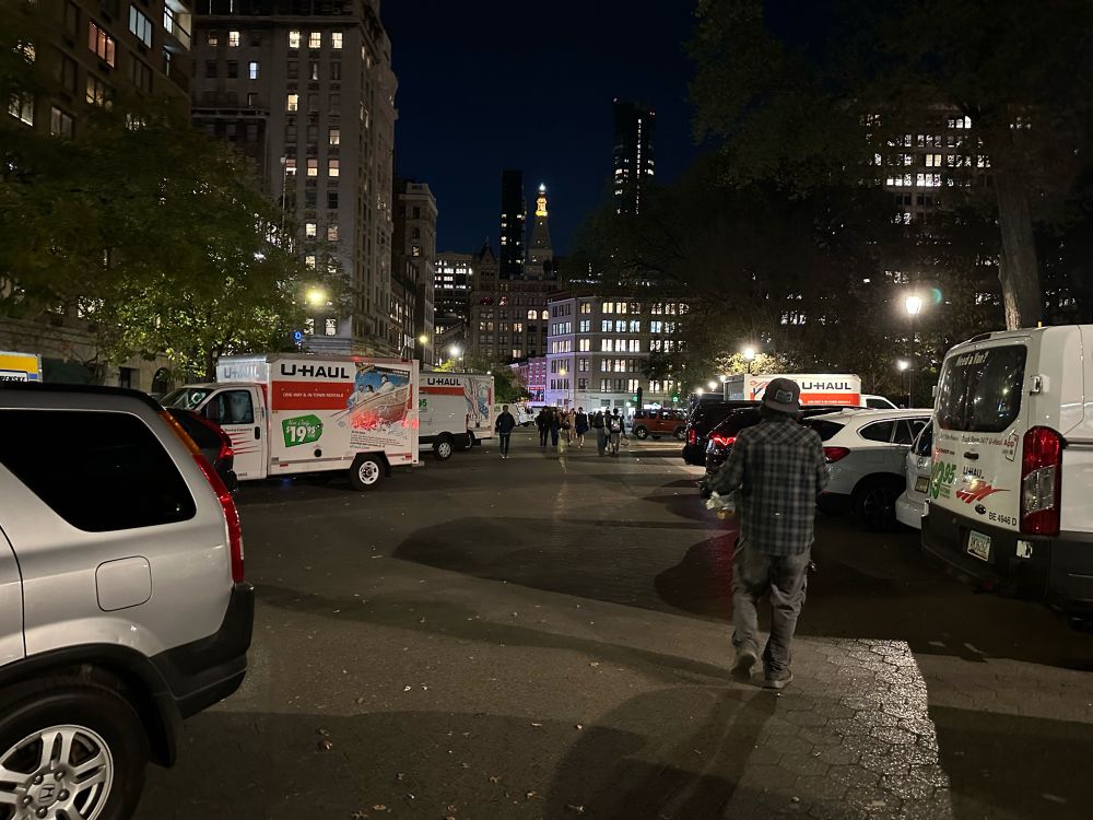Union Square with dozens of vehicles parked on the plaza 