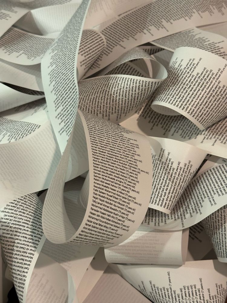 Closeup of list of names printed on receipt paper
