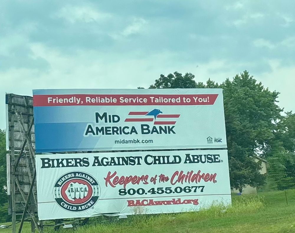 Sign on rural route 50 in MO sponsored by bikers against child abuse 