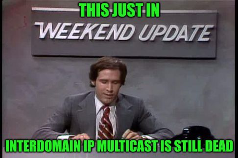 Chevy Chase doing the Saturday Night Weekend Update with caption: This just in Interdomain IP multicast is still dead