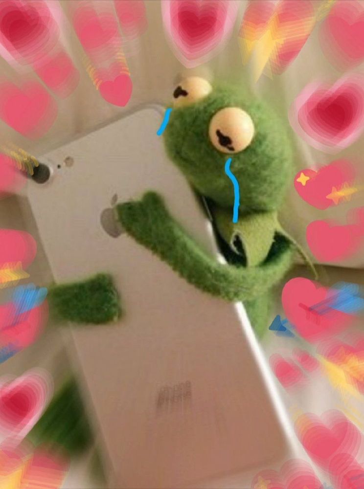 Kermit crying holding and hugging iPhone with hearts around 