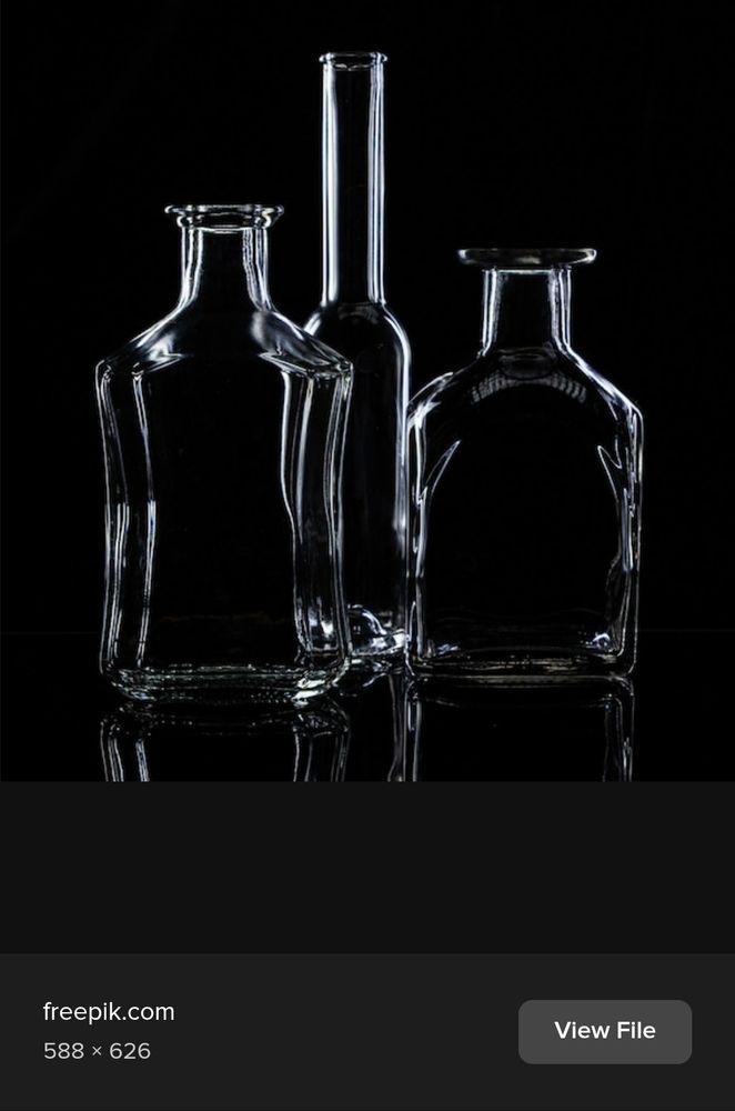 Screenshot image of highlights on darkly-lit lass bottles