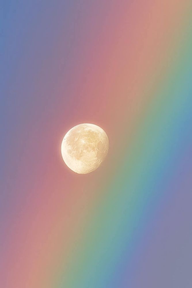 Source: unknown
Moon with a rainbow cutting across. More zoomed in on the moon, which is nearly a full moon.