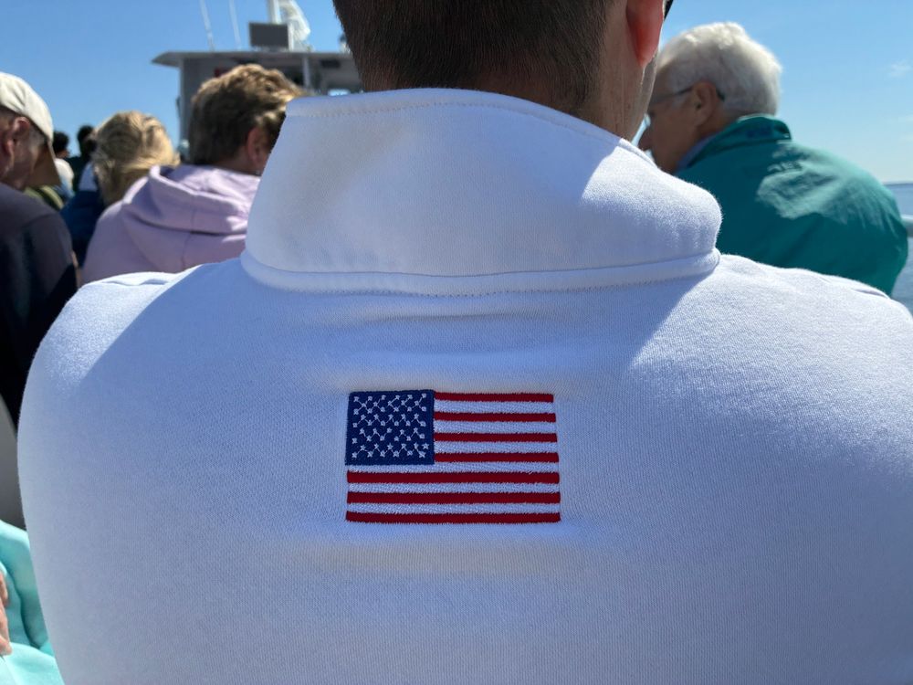 An embroidered American flags on a shirt, with an extra star
