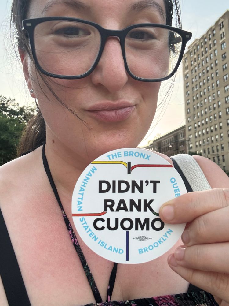 Me, stunningly beautiful, holding an “I Didn’t Rank Cuomo” sticker 
