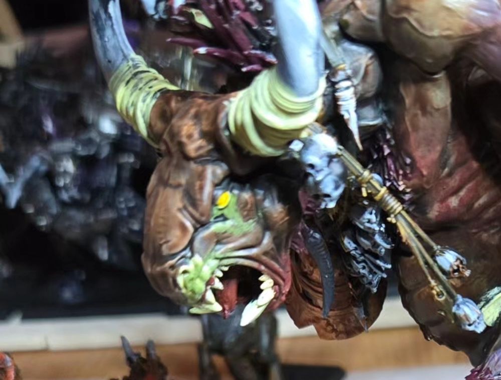 It's the same model pictured in the quoted skeet, but the face is now darker, with green and yellow slime coming from the creature's nose and eyes. 