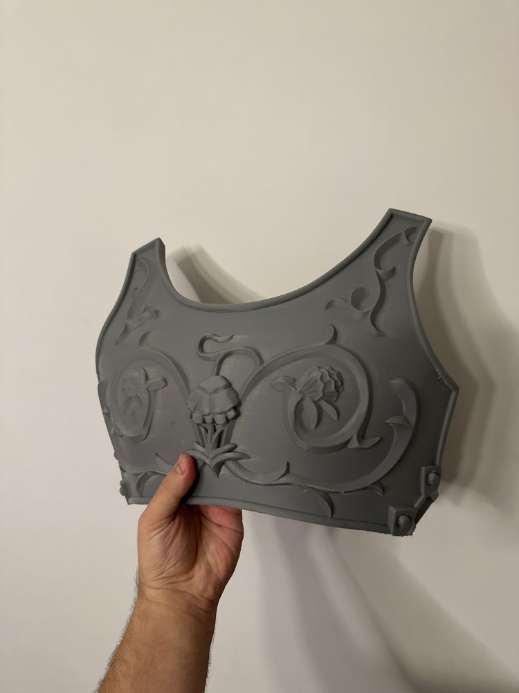 Plastic armor piece from Blasphemous game