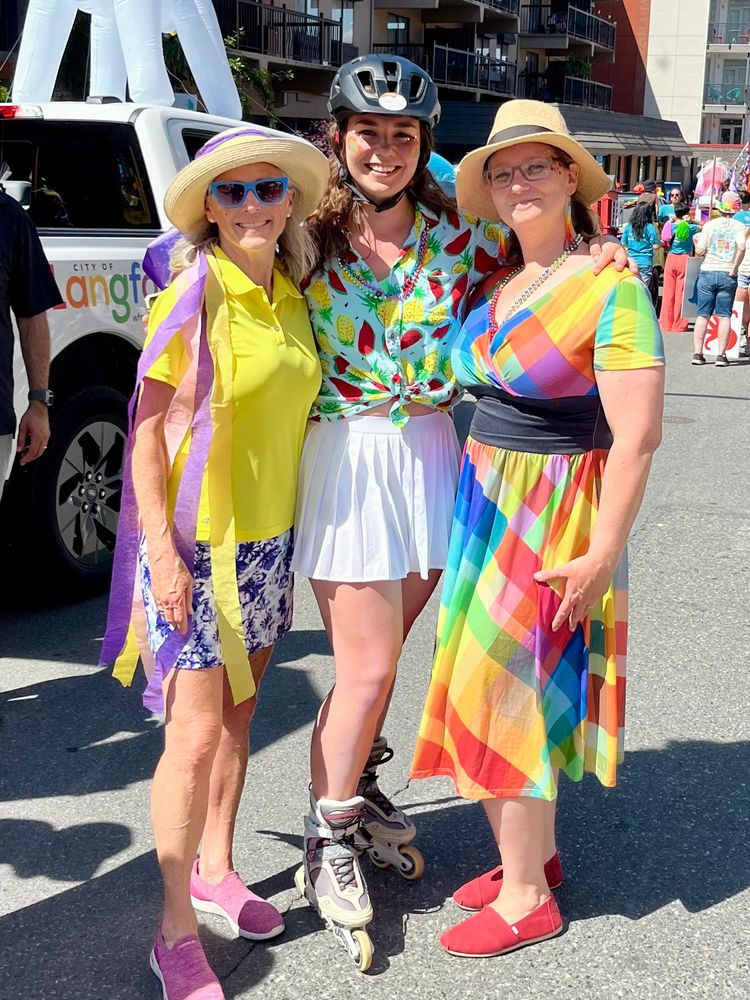 Councillors Szpak, Harder and Guiry in front of the Langford Lightening truck decorated for the parade 