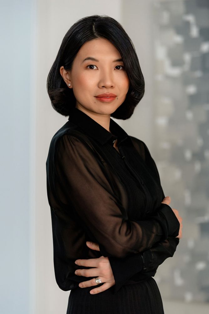 Disney Lam crossing her arms as she poses for a photo