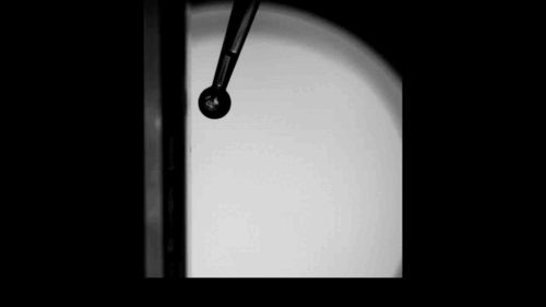 A ball rolling vertically