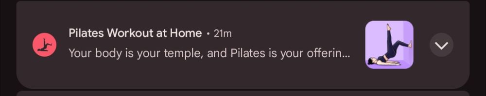 A screenshot of a phone notification that reads: "Your body is a temple and Pilates is your offering." 