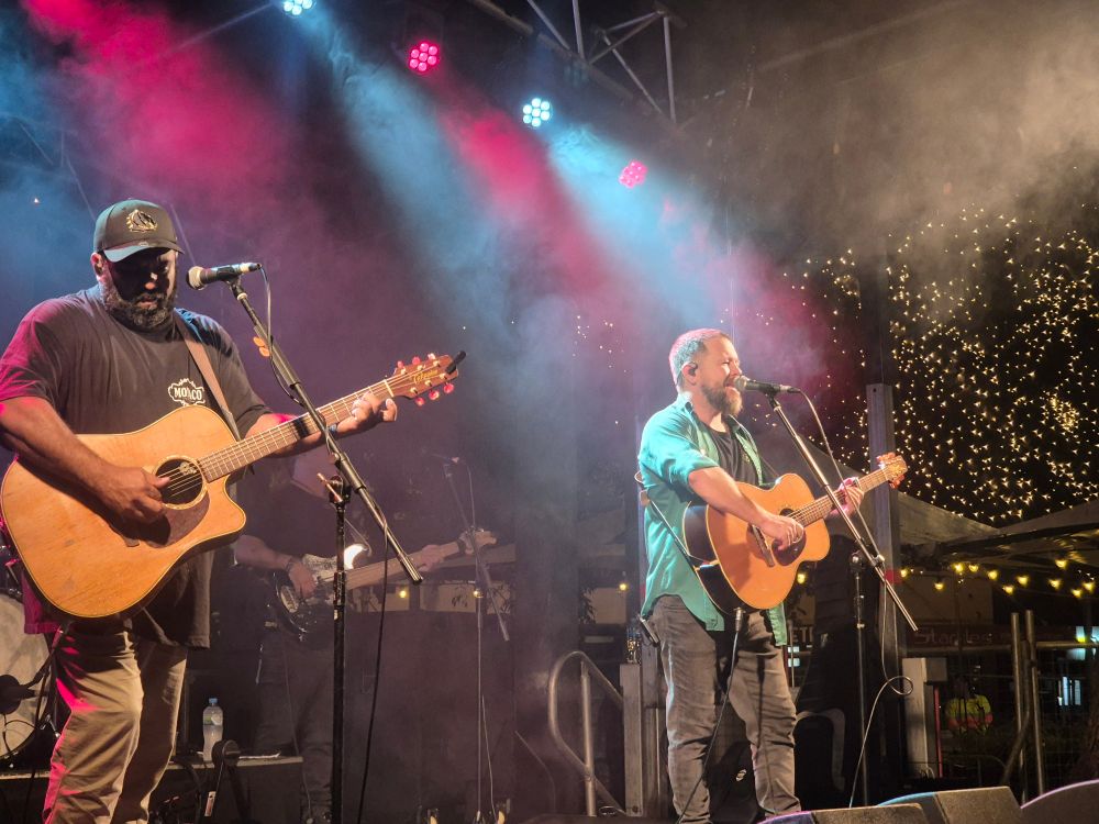 Tom Busby and Jeremy Marou. On stage performing at the Stones Corner Festival Brisbane Queensland Australia