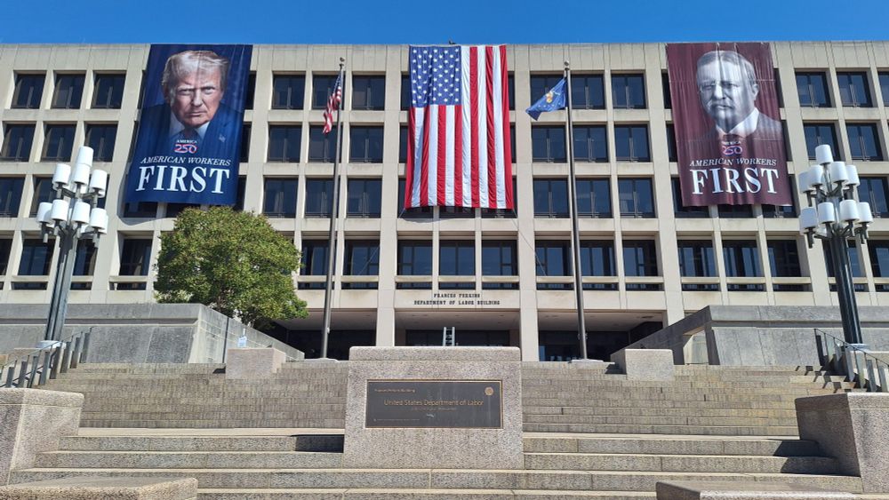 Banners with Teddy and Trump's face on them in DC