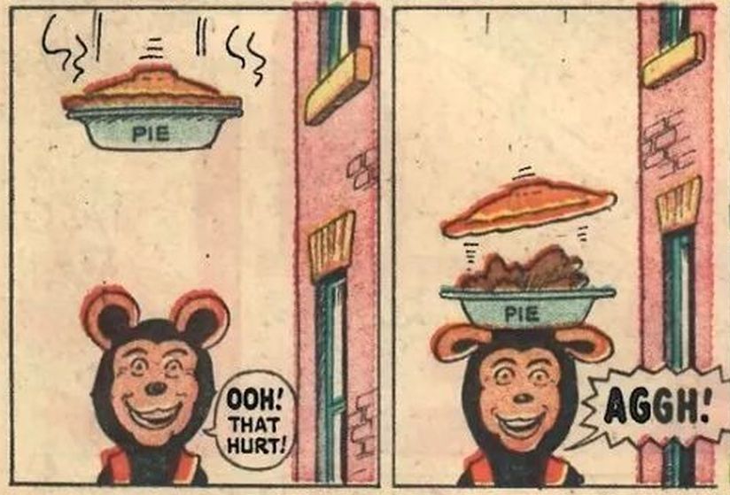 Biffo maintains an unsettling rictus as he reels in pain from something that happened previously, just in time for a pie (labeled "PIE") to fall pan-first on his head.
BIFFO: Ooh! That hurt! AGGH!
