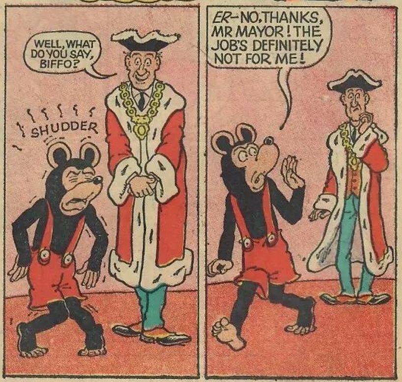 The Mayor of Beanotown proposes something to Biffo which makes him shudder in revulsion.
MAYOR OF BEANOTOWN: Well, what do you say, Biffo?
BIFFO: (audible SHUDDER emanata)
BIFFO: Er-- No, thanks, Mr. Mayor! The job's definitely not for me!