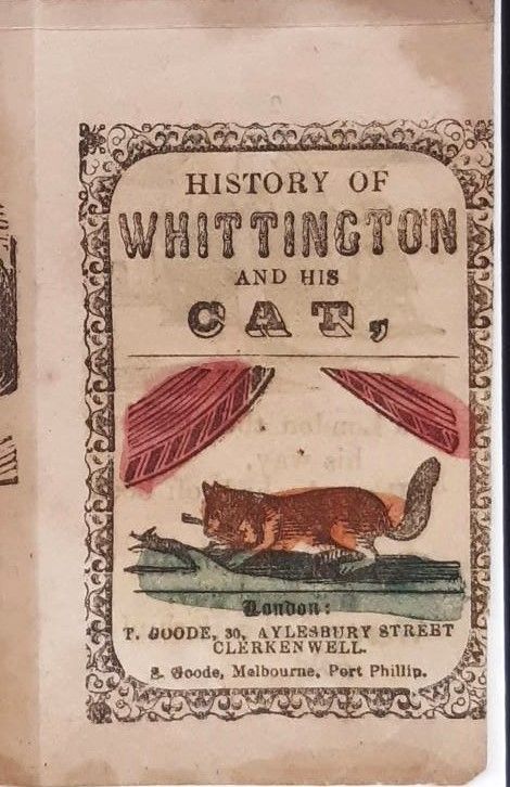 ‘History of Whittington and his Cat’. London, between 1855-1860. Detail from an uncut book sheet, hand-coloured. Shows a cat facing left crouching on grass under red curtains. An ornate border surrounds the title and illustration.