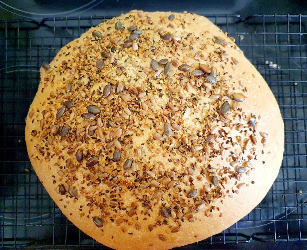 Round loaf is round. Flatish and has mixed seeds on top. Jonathan complained about getting flour on his jeans when I make floury things, so he can have seeds getting everywhere instead =P