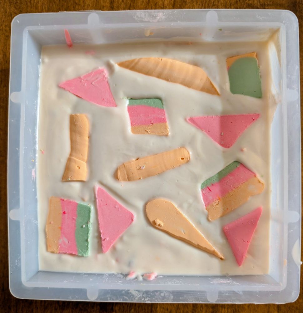 A square of soap with abstract shapes in the top