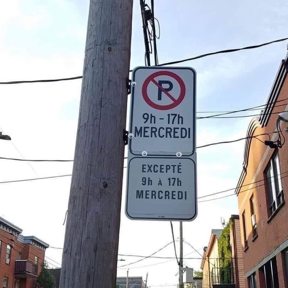 Affiche qui interdit le stationnement entre 9h et 17h les mercredi, excepté entre 9h et 17h les mercredis