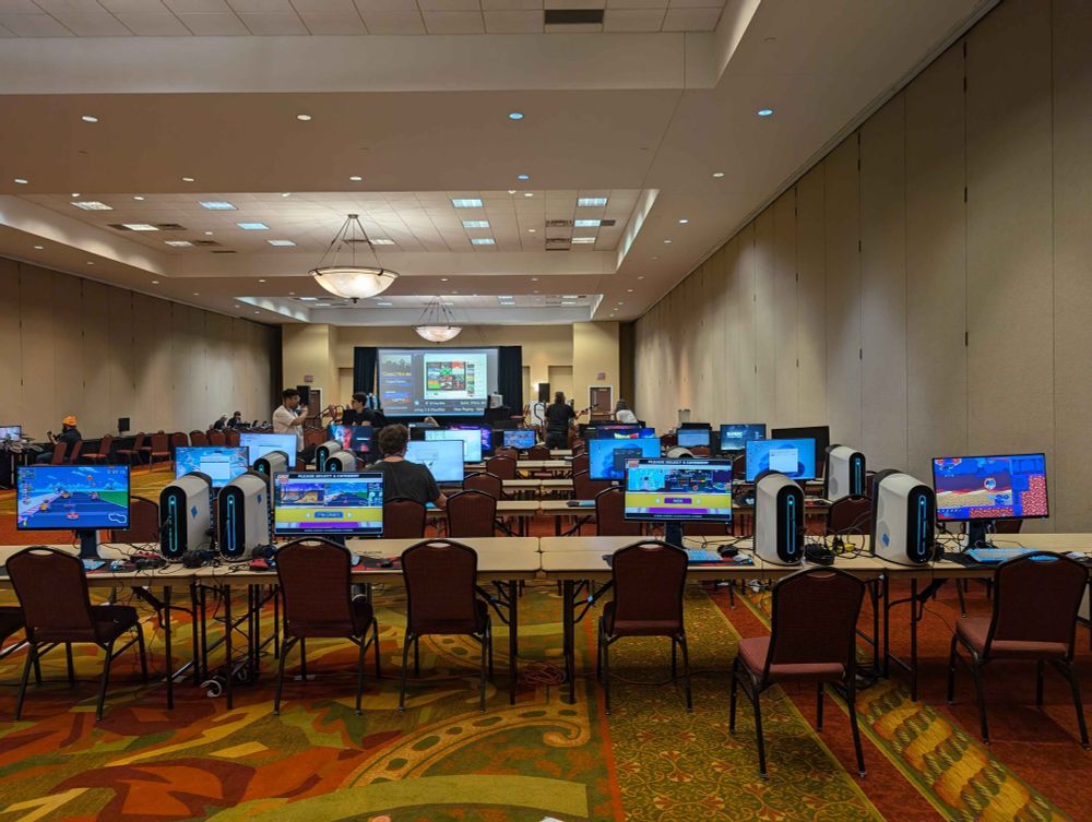 Four SAGE booths inside of a game room in the SONICEXPO Convention.