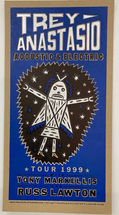Poster for 1999 Trey Anastasio tour featuring blue black and gold colors with a robot type drawing.