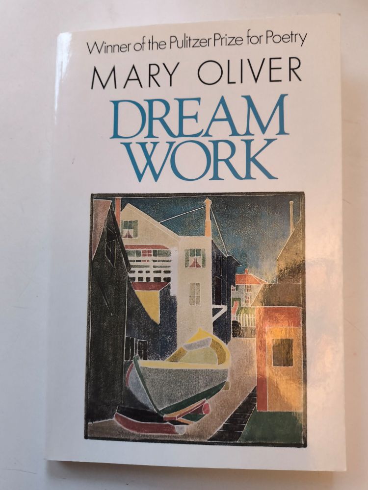 Cover of Mary Oliver's book *Dream Work * White, with a painting of a seaside town with a small boat sitting on a pier next to the water.