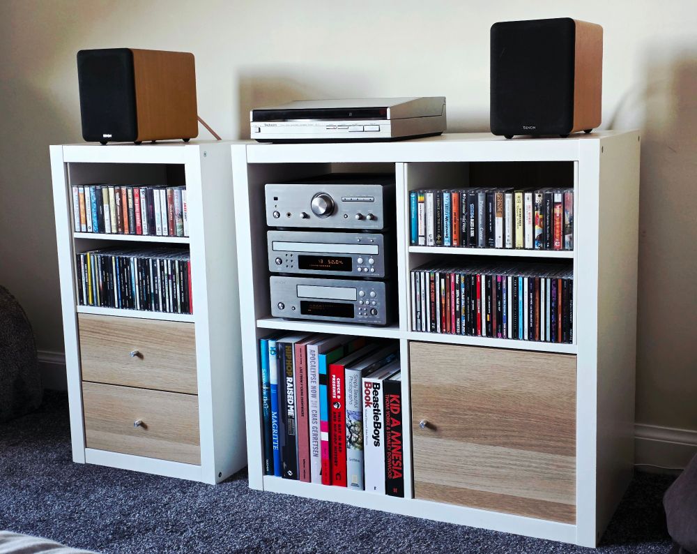 My bedroom hi-fi system consisting of an Denon mini component system with amp, tape deck and rare 3 disk CD changer, Denon speakers and a Technics SL-5 turntable. 