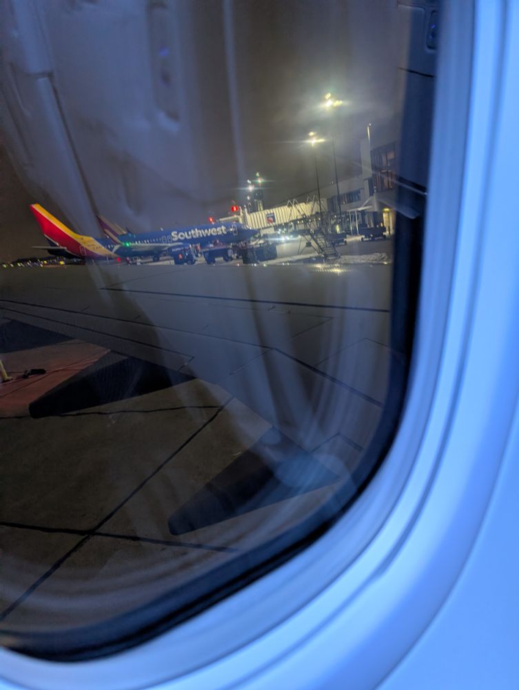 Plane window, about to depart