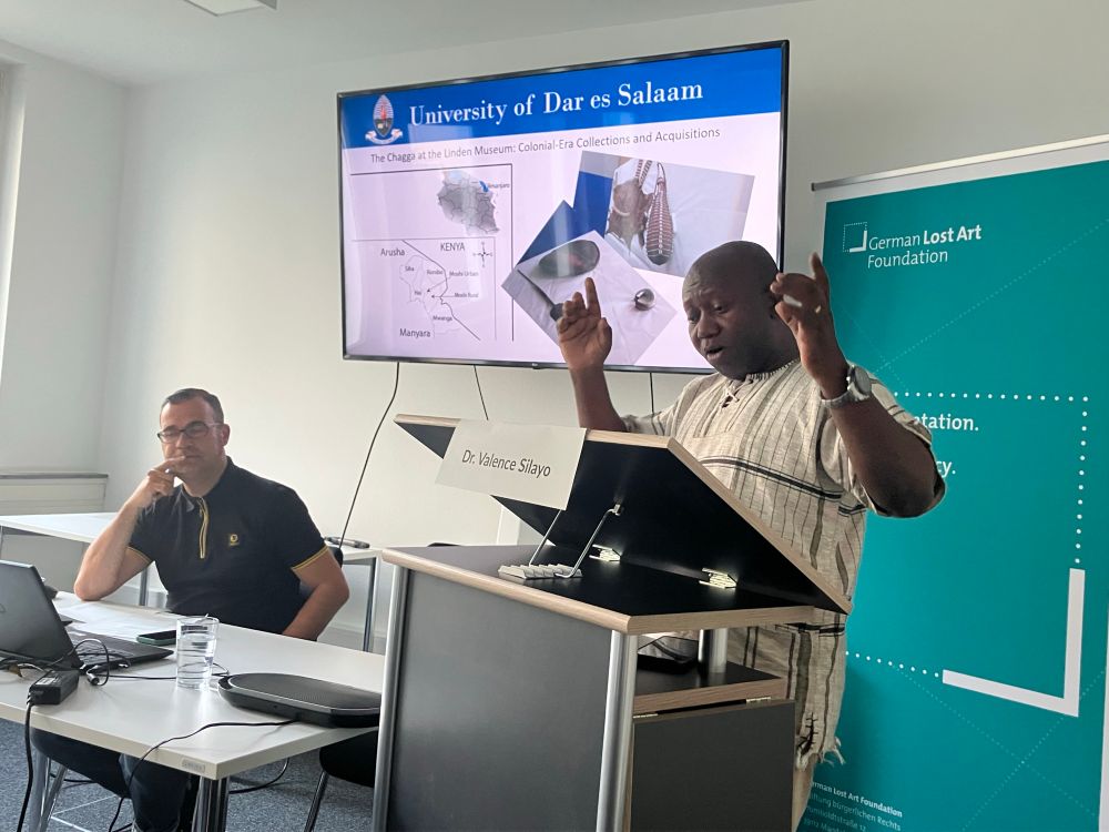 Photo of Dr Valence Silayo presenting his findings on Chagga belongings at Linden Museum Stuttgart 