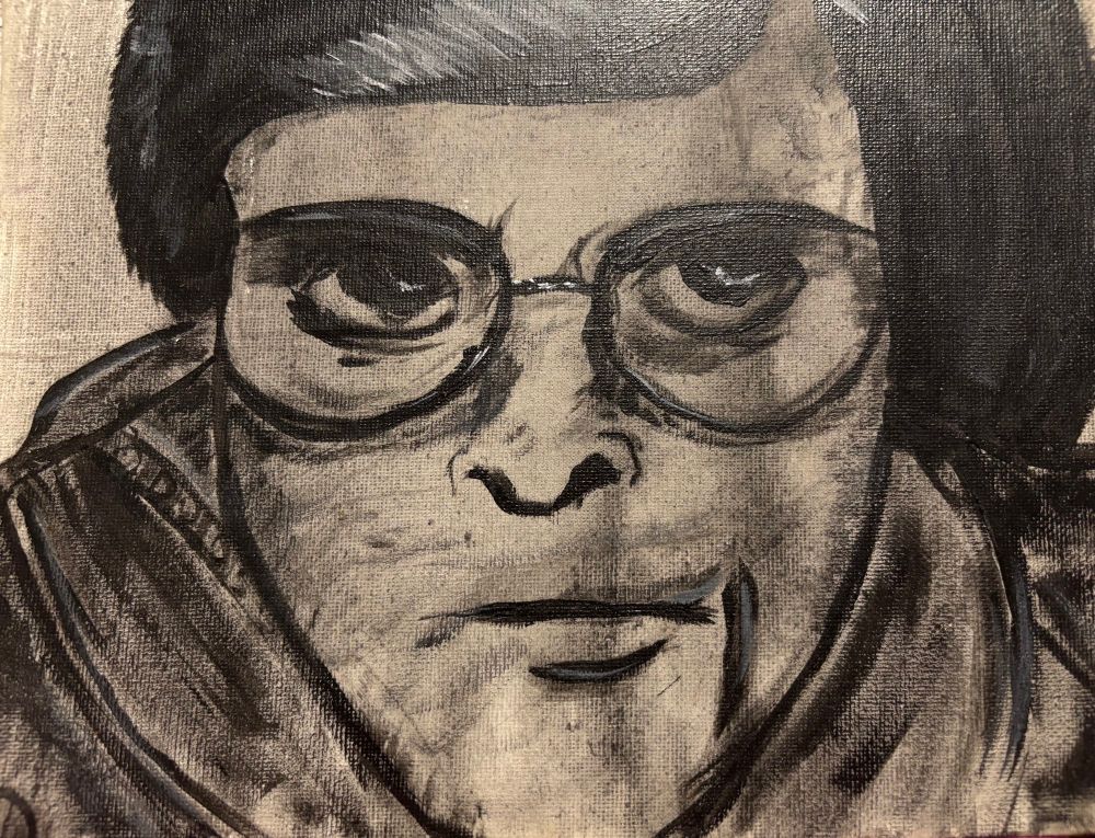 A greyscale painting of a man, Harlan Ellison. He is wearing glasses and looking sternly at you.