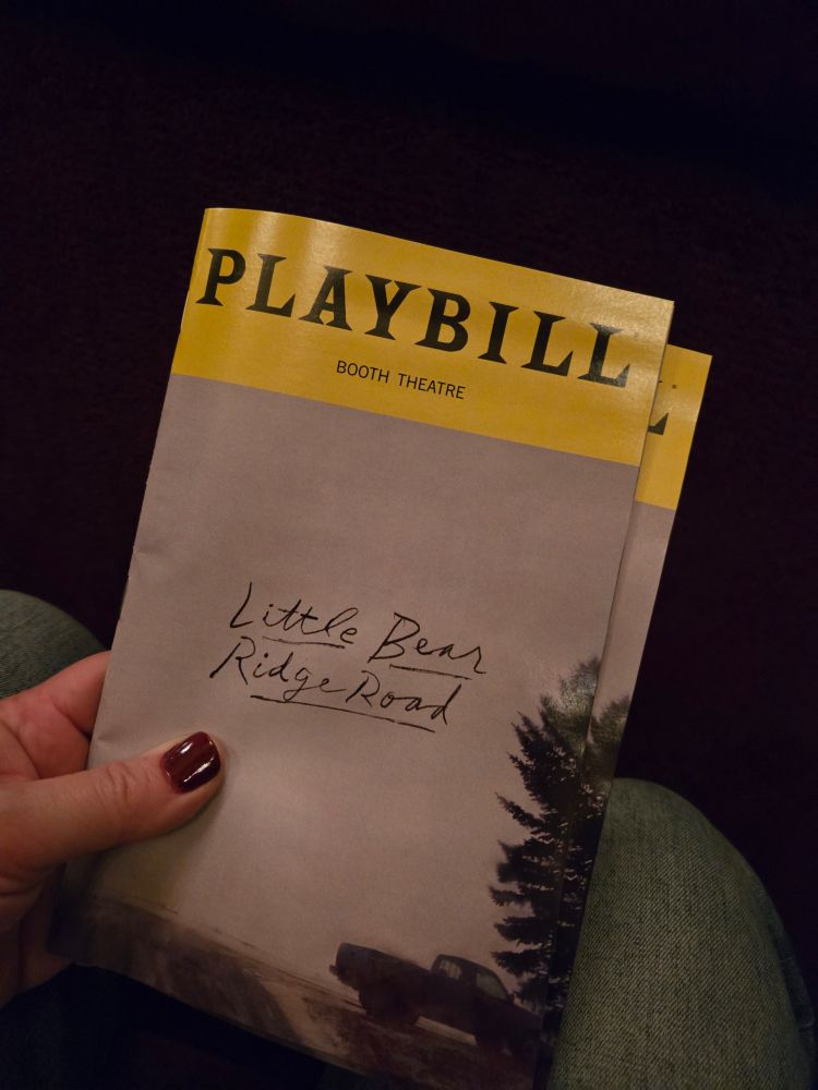 Photos of the Playbill for Little Bear Ridge Road, which just shows an old pickup truck parked under a tree in the fog.