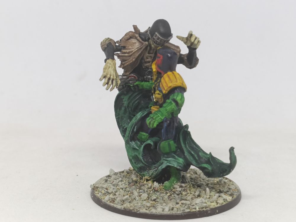 Judge Dredd battles the spectral form of Judge Death.  Miniature is from Warlord Games.
