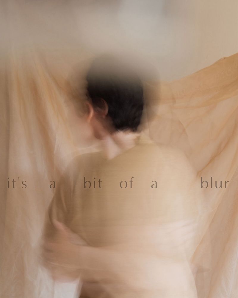 A blurry figure with the text "it's a bit of a blur".