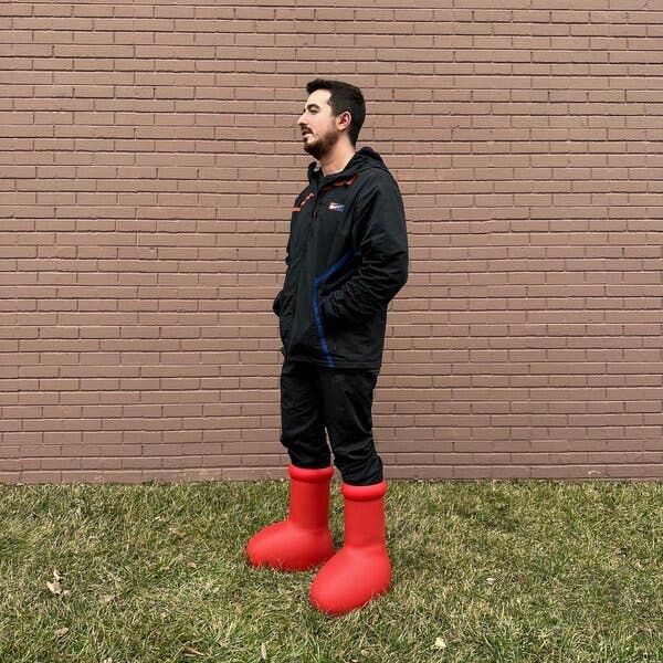 loser wearing ginormous red boots